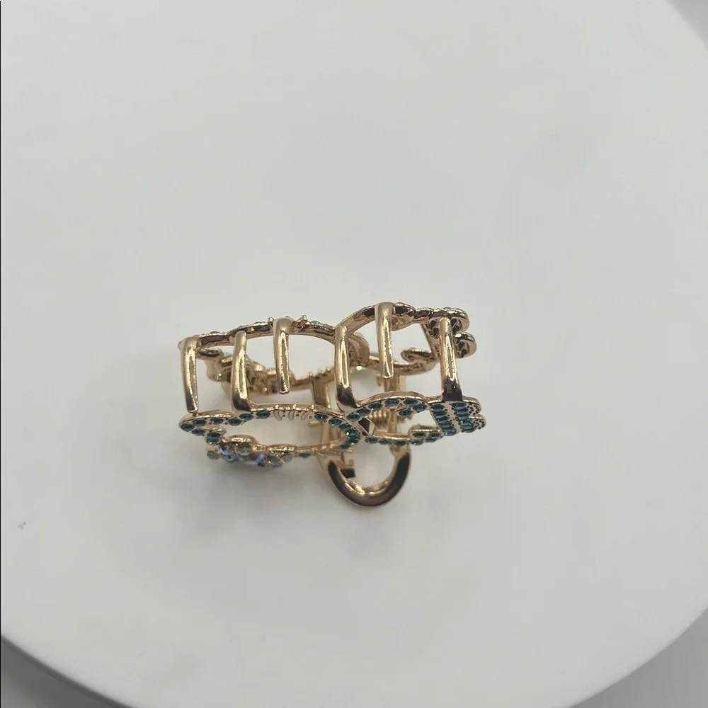 929. Gold and Blue Hello Kitty Hair Clip